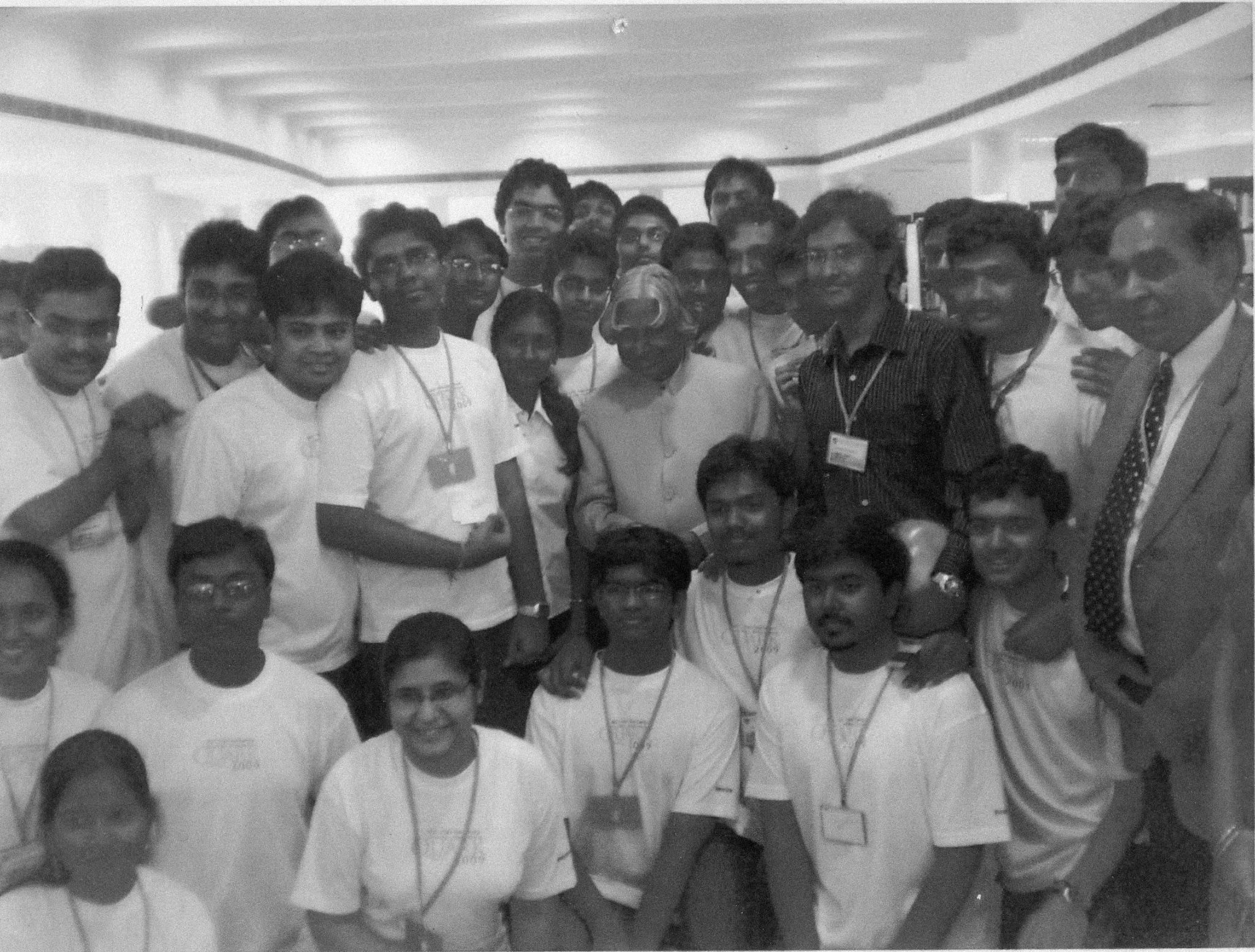 Abhinav with fellow engineering students around Dr. APJ Abdul Kalam